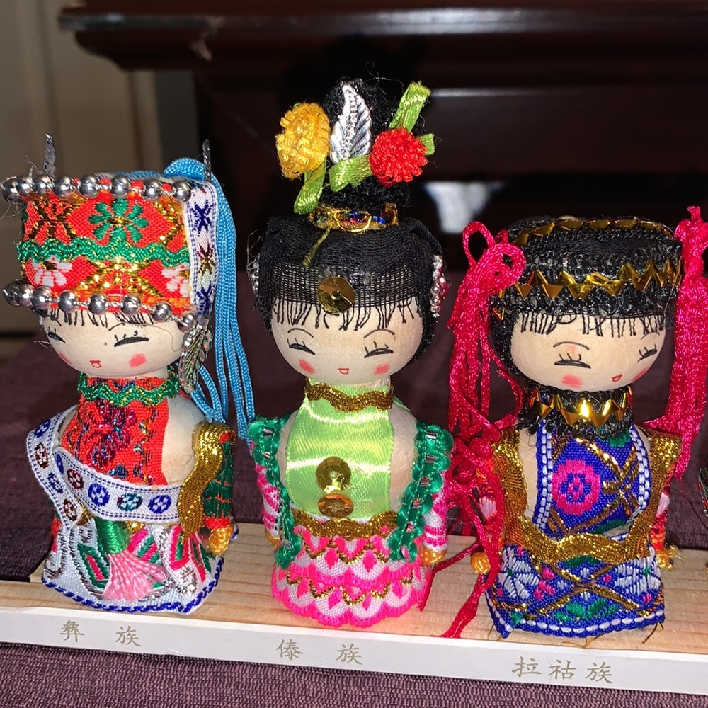 Handcrafted Set of 7 Asian Wooden Dolls In Traditional Costumes